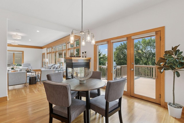 4301 Overlook Dr, Bloomington, MN 55437 - dining space featuring light wood-style floors, french doors, and recessed lighting