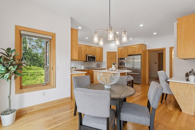 4301 Overlook Dr, Bloomington, MN 55437 - dining room featuring light wood-style flooring and recessed lighting