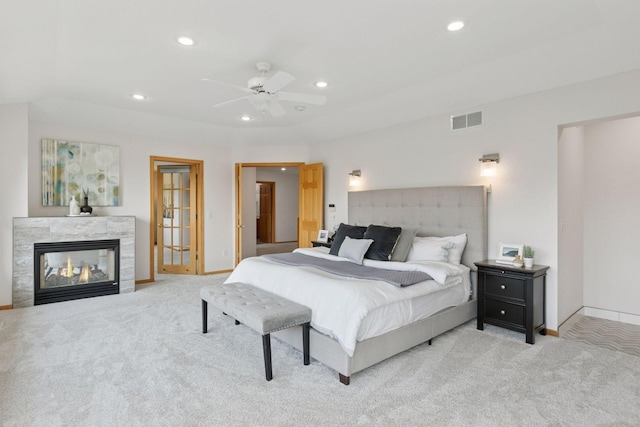 4301 Overlook Dr, Bloomington, MN 55437 - carpeted bedroom featuring recessed lighting, a tile fireplace, and ceiling fan