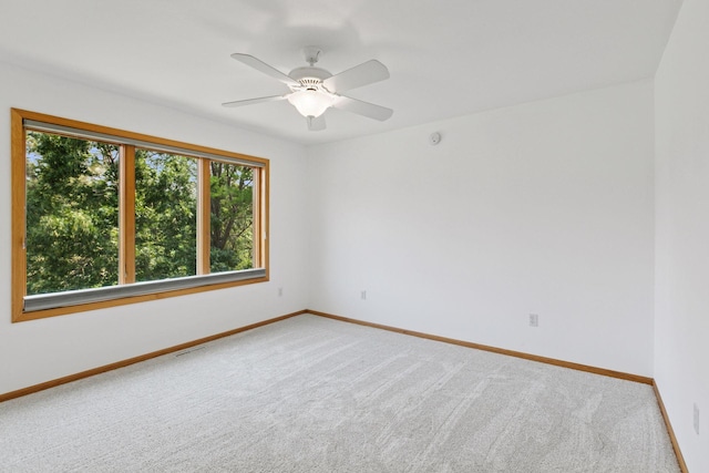 4301 Overlook Dr, Bloomington, MN 55437 - carpeted spare room featuring baseboards and ceiling fan