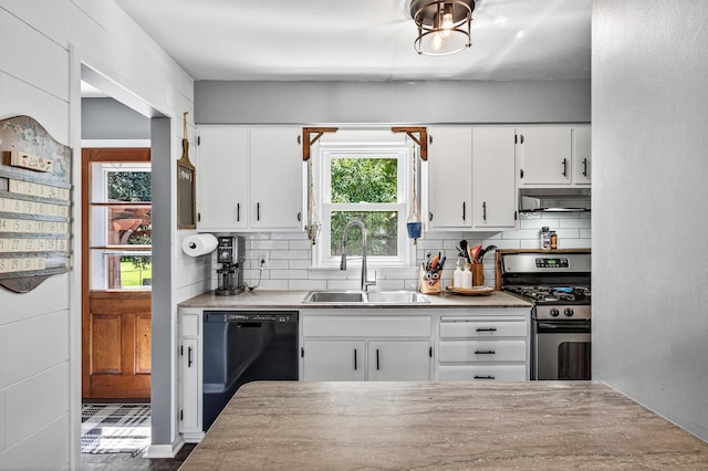 4309 78th Ave N, Brooklyn Park, MN 55443 - kitchen featuring stainless steel gas stove, black dishwasher, backsplash, and white cabinets