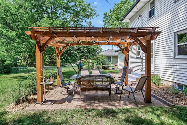 4309 78th Ave N, Brooklyn Park, MN 55443 - fenced backyard with a pergola and a patio area