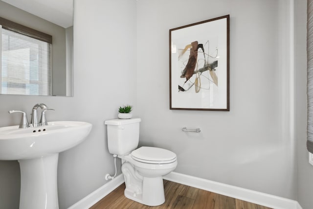 930 151st Ave NW, Andover, MN 55304 - half bath with baseboards and wood finished floors