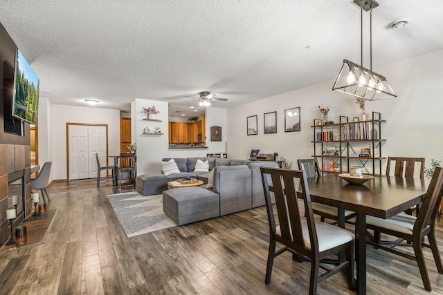 4940 Underwood Ln N Unit 4940B, Plymouth, MN 55442 - dining room with a textured ceiling, dark wood-type flooring, and a ceiling fan