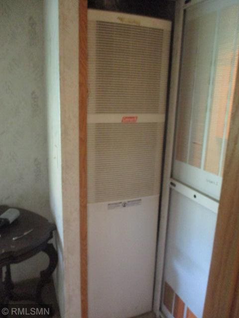 32546 360th St, Kimberly Twp, MN 56431 - closet with a heating unit