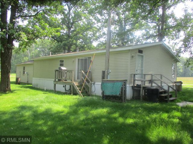 32546 360th St, Kimberly Twp, MN 56431 - rear view of property with a lawn