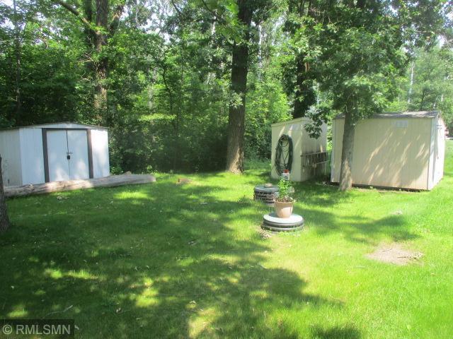 32546 360th St, Kimberly Twp, MN 56431 - view of green lawn featuring a shed