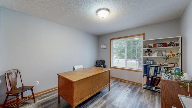 1902 11th Ave NE, Kasson, MN 55944 - home office featuring wood finished floors and a textured ceiling