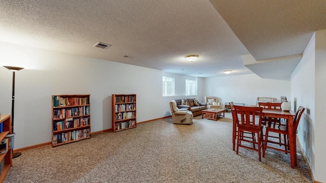 1902 11th Ave NE, Kasson, MN 55944 - dining space with carpet flooring and a textured ceiling