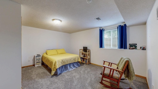 1902 11th Ave NE, Kasson, MN 55944 - bedroom with carpet floors and a textured ceiling