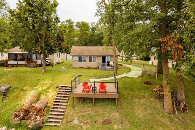 4236 Smith Lake Rd SE, Osakis, MN 56360 - rear view of property with a wooden deck, a lawn, stairway, and an outbuilding