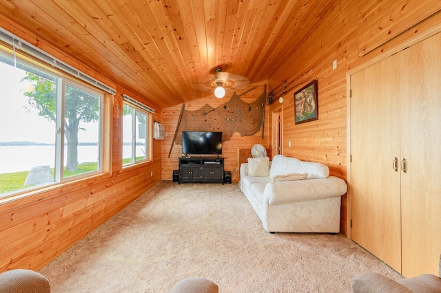 4236 Smith Lake Rd SE, Osakis, MN 56360 - living room with light colored carpet, wooden walls, vaulted ceiling, wood ceiling, and a water view