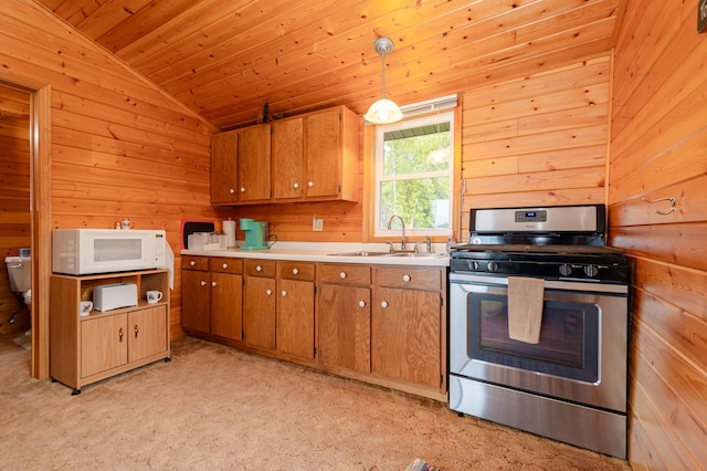 4236 Smith Lake Rd SE, Osakis, MN 56360 - kitchen featuring lofted ceiling, stainless steel range with gas stovetop, wood walls, wood ceiling, and brown cabinetry