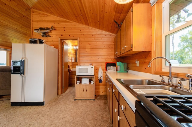 4236 Smith Lake Rd SE, Osakis, MN 56360 - kitchen featuring vaulted ceiling, wooden ceiling, healthy amount of natural light, white appliances, and wood walls