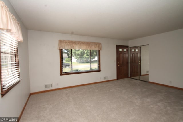 5327 53rd Ave N, Crystal, MN 55429 - carpeted empty room with baseboards