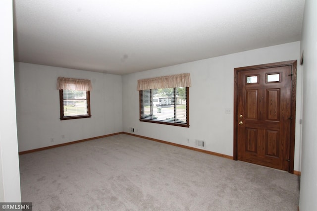 5327 53rd Ave N, Crystal, MN 55429 - unfurnished room with healthy amount of natural light and light carpet