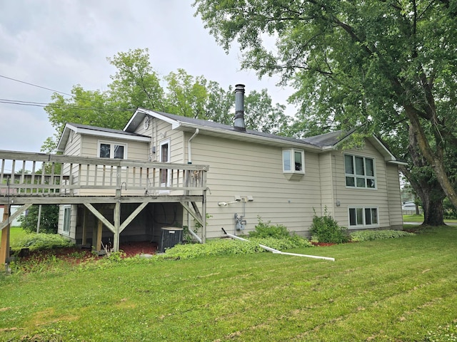 1218 2nd Ave E, International Falls, MN 56649 - rear view of property with a deck and a lawn