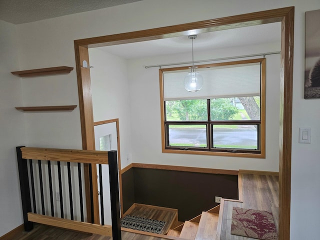 1218 2nd Ave E, International Falls, MN 56649 - stairway featuring wood finished floors