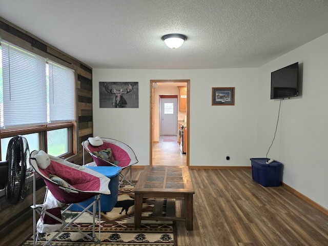 1218 2nd Ave E, International Falls, MN 56649 - living area with wood finished floors and a textured ceiling