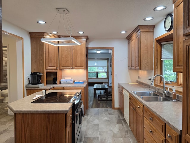 1218 2nd Ave E, International Falls, MN 56649 - kitchen featuring black range with electric cooktop, dishwasher, a kitchen island, recessed lighting, and light countertops