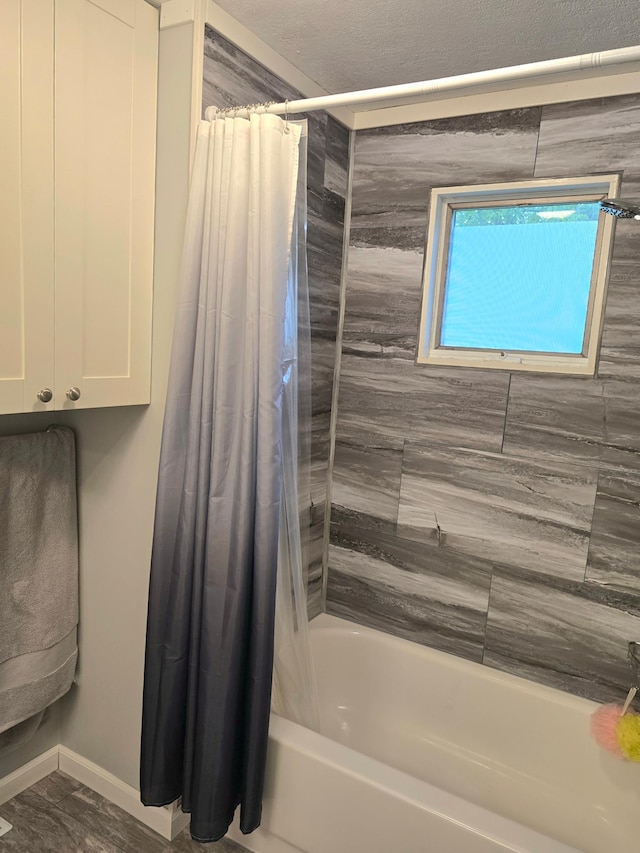 1218 2nd Ave E, International Falls, MN 56649 - full bathroom with shower / tub combo with curtain and baseboards