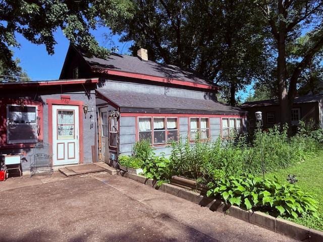 720 Main St, Clearwater, MN 55320 - view of front of house featuring a chimney