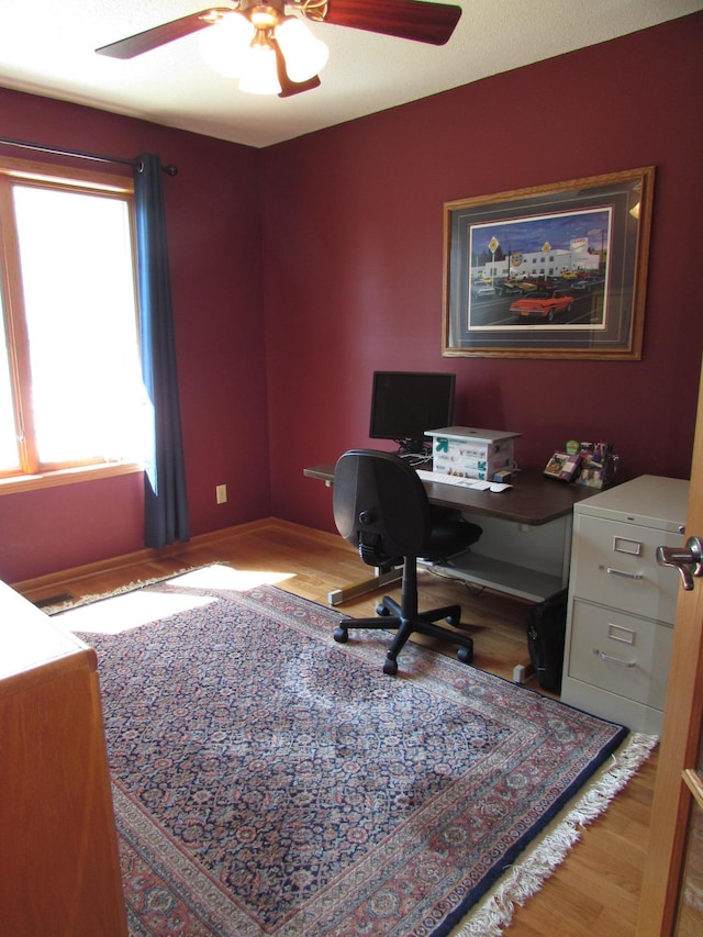 1575 Cornerstone Ln, Owatonna, MN 55060 - office area featuring ceiling fan and baseboards