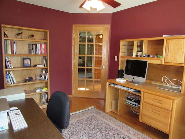1575 Cornerstone Ln, Owatonna, MN 55060 - home office with wood finished floors and ceiling fan