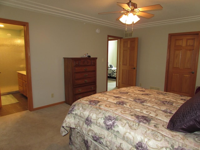 1575 Cornerstone Ln, Owatonna, MN 55060 - bedroom with light colored carpet, ornamental molding, ensuite bathroom, and a ceiling fan