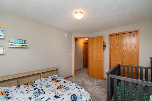 3590 Fillmore St S, Fargo, ND 58104 - carpeted bedroom with a textured ceiling and a closet