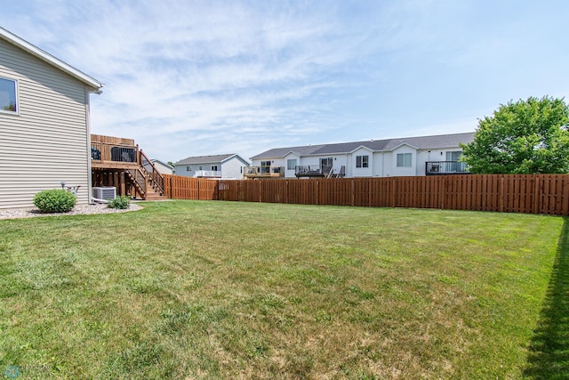 3590 Fillmore St S, Fargo, ND 58104 - view of yard featuring a residential view, stairway, and a wooden deck