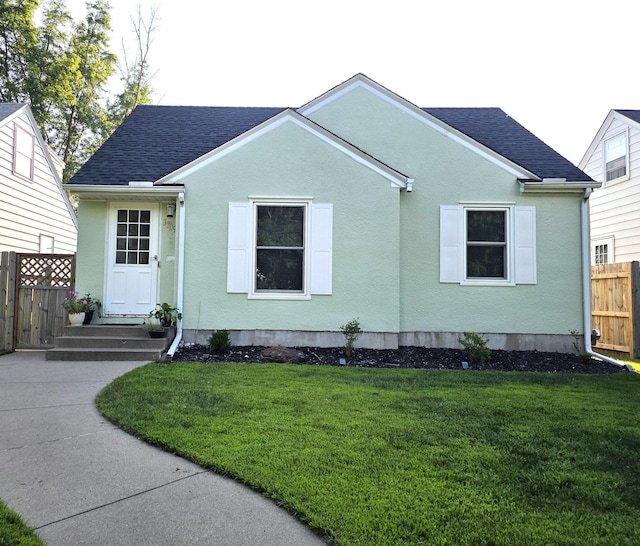 3709 Quail Ave N, Robbinsdale, MN 55422 - view of front of property featuring a shingled roof and stucco siding