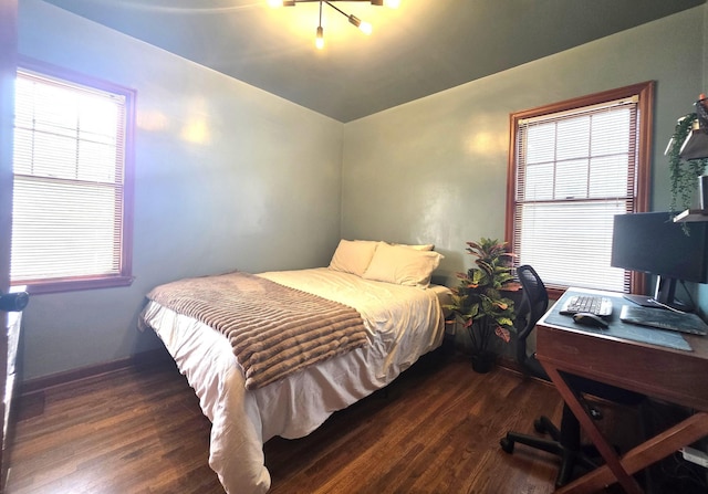 3709 Quail Ave N, Robbinsdale, MN 55422 - bedroom featuring dark wood-type flooring and a desk