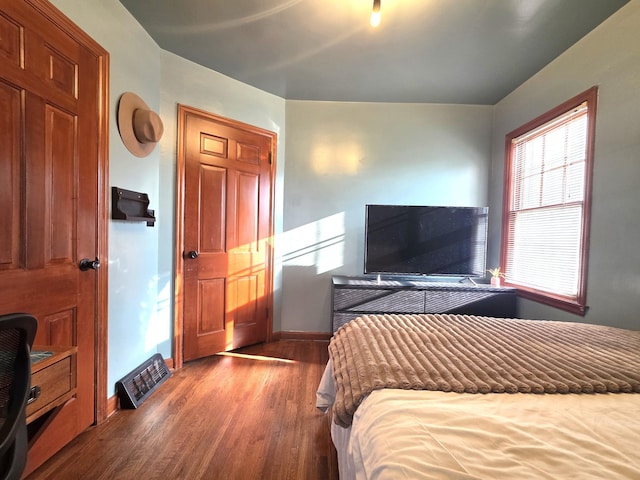 3709 Quail Ave N, Robbinsdale, MN 55422 - bedroom with wood finished floors and baseboards