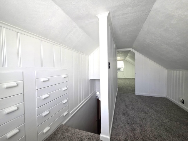 3709 Quail Ave N, Robbinsdale, MN 55422 - additional living space featuring carpet, vaulted ceiling, a textured ceiling, and cooling unit