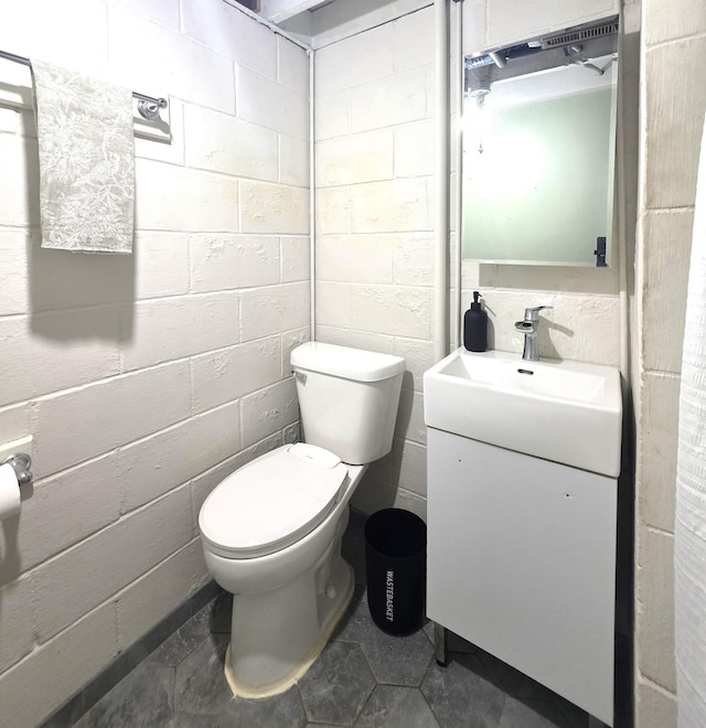 3709 Quail Ave N, Robbinsdale, MN 55422 - bathroom with vanity and concrete block wall
