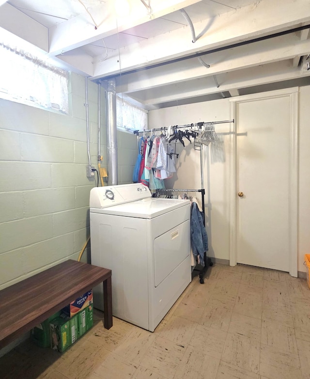 3709 Quail Ave N, Robbinsdale, MN 55422 - laundry room featuring washer / dryer, light flooring, and concrete block wall