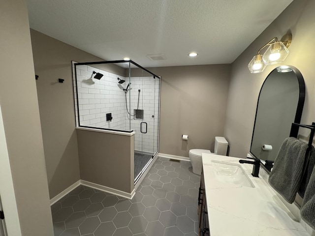 23900 Taurus St, Linwood Twp, MN 55079 - bathroom with tile patterned floors, vanity, a stall shower, a textured ceiling, and recessed lighting