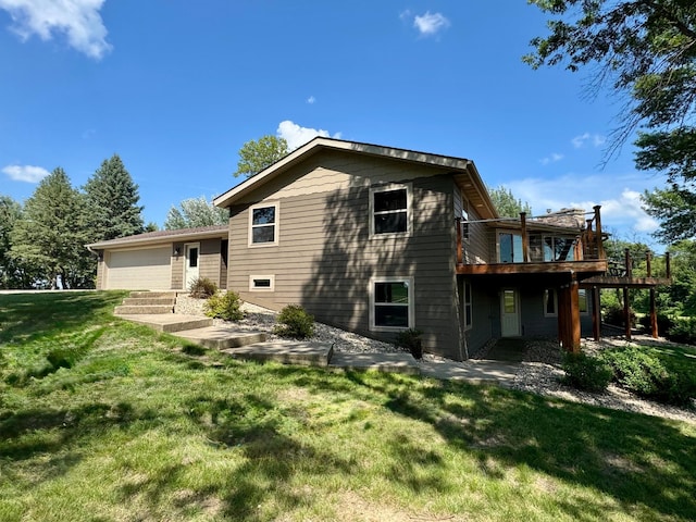 90760 US Highway 71, Christiania Twp, MN 56101 - rear view of house with a lawn, a deck, and a garage