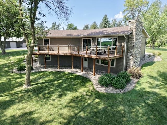 90760 US Highway 71, Christiania Twp, MN 56101 - back of property featuring a wooden deck, a chimney, and a lawn