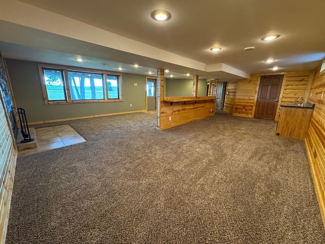 90760 US Highway 71, Christiania Twp, MN 56101 - below grade area featuring carpet floors, wood walls, recessed lighting, and bar