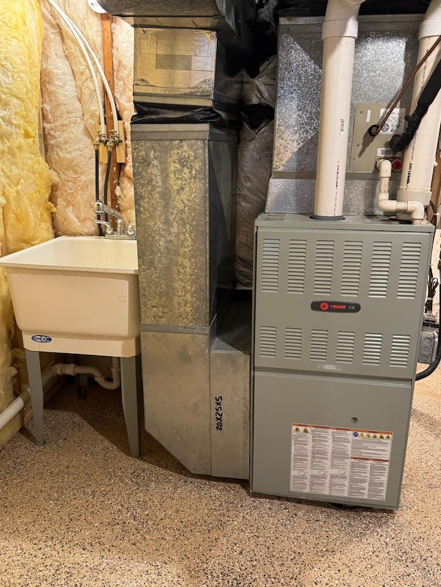 90760 US Highway 71, Christiania Twp, MN 56101 - utilities with heating unit and a sink