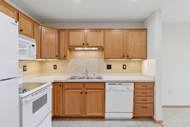 2231 Penn Pl Unit 224, North Saint Paul, MN 55109 - kitchen with white appliances, decorative backsplash, and light countertops