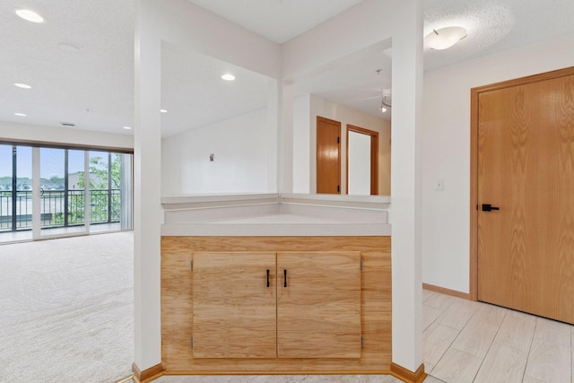 2231 Penn Pl Unit 224, North Saint Paul, MN 55109 - bathroom featuring recessed lighting, vanity, and a water view
