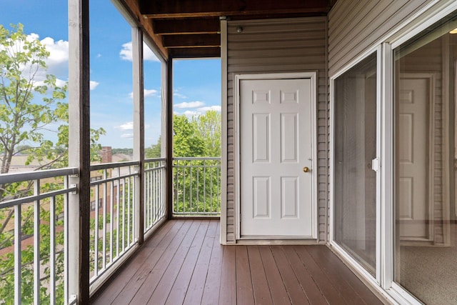 2231 Penn Pl Unit 224, North Saint Paul, MN 55109 - unfurnished sunroom with hardwood / wood-style floors