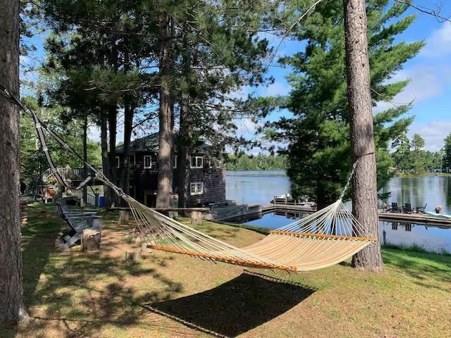5607 Skogvei Rd, Duluth, MN 55803 - dock featuring a water view and a yard