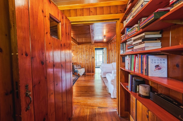 5607 Skogvei Rd, Duluth, MN 55803 - corridor featuring wooden walls, hardwood / wood-style flooring, and wooden ceiling