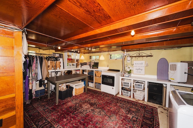 5607 Skogvei Rd, Duluth, MN 55803 - below grade area featuring washing machine and clothes dryer and wooden ceiling