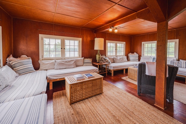 5607 Skogvei Rd, Duluth, MN 55803 - living room with a wooden ceiling with exposed beams, wooden walls, and wood finished floors