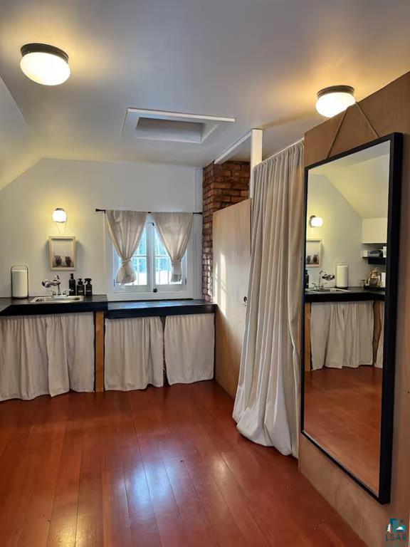 5607 Skogvei Rd, Duluth, MN 55803 - bedroom with dark wood-style floors and lofted ceiling